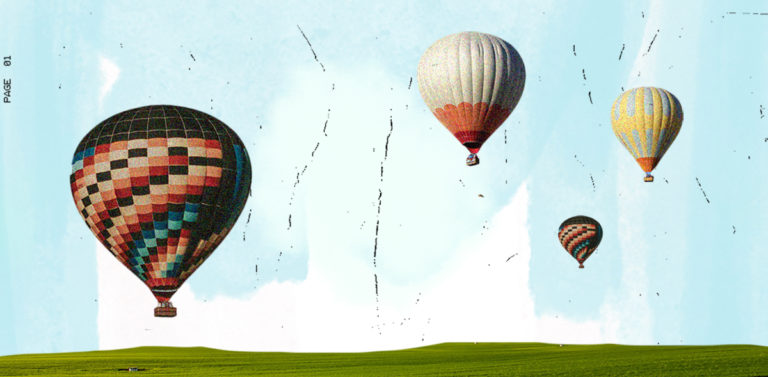 Domestic travel is king for hotels cover image. Featuring hot air balloons against a blue sky.